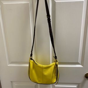 Bright Yellow Purse like new.  Leather body.